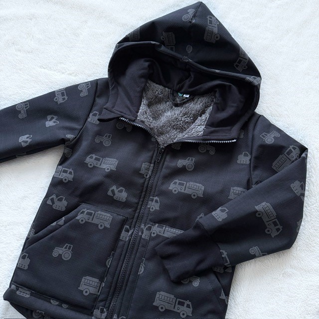 Kinder-Softshelljacke mit Lammfell **REFLEKTIERENDE BAUMASCHINEN**