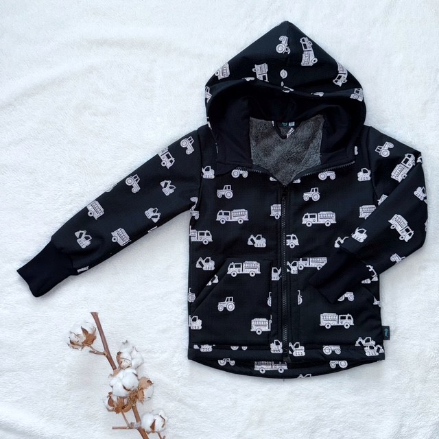 Kinder-Softshelljacke mit Lammfell **REFLEKTIERENDE BAUMASCHINEN**